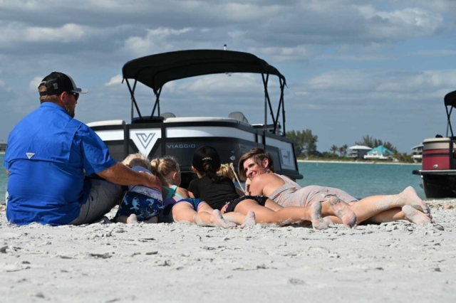 The family relaxing on the Sand at Gasparilla in Southern Florida